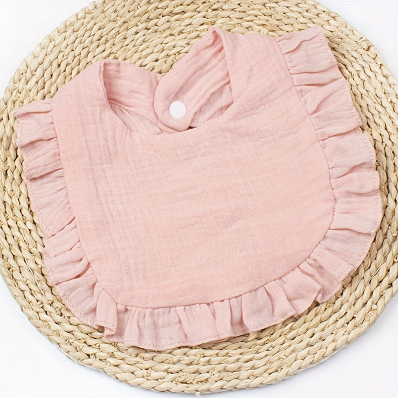 Baby Bibs in a Ten-Piece Mix of Solid Colors and Playful Prints with Ruffled Edges and Snap Closures