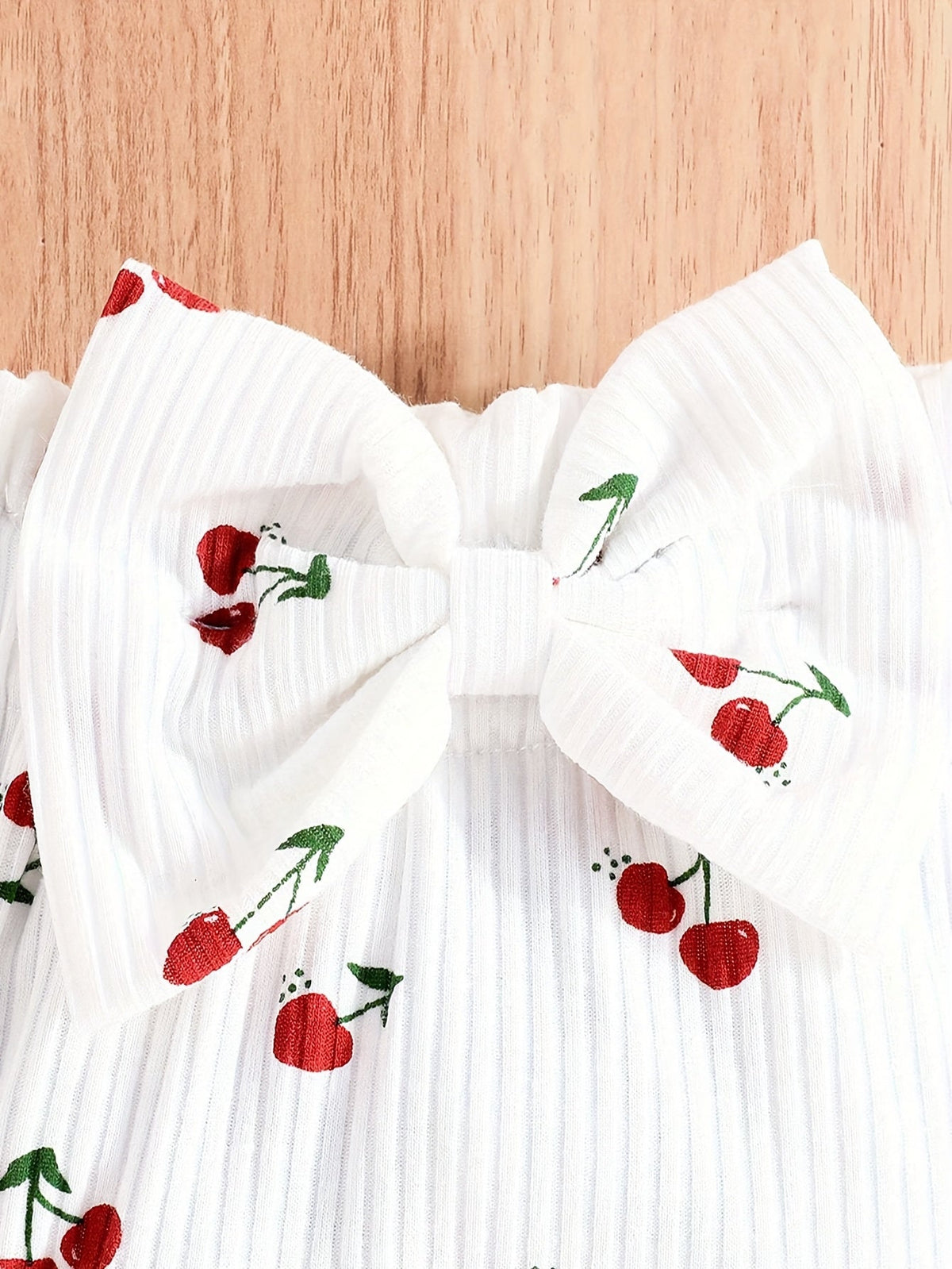 Baby Girl Cherry Outfit Set with a Ruffle Strap Bodysuit and Bow Shorts in White for Spring and Summer
