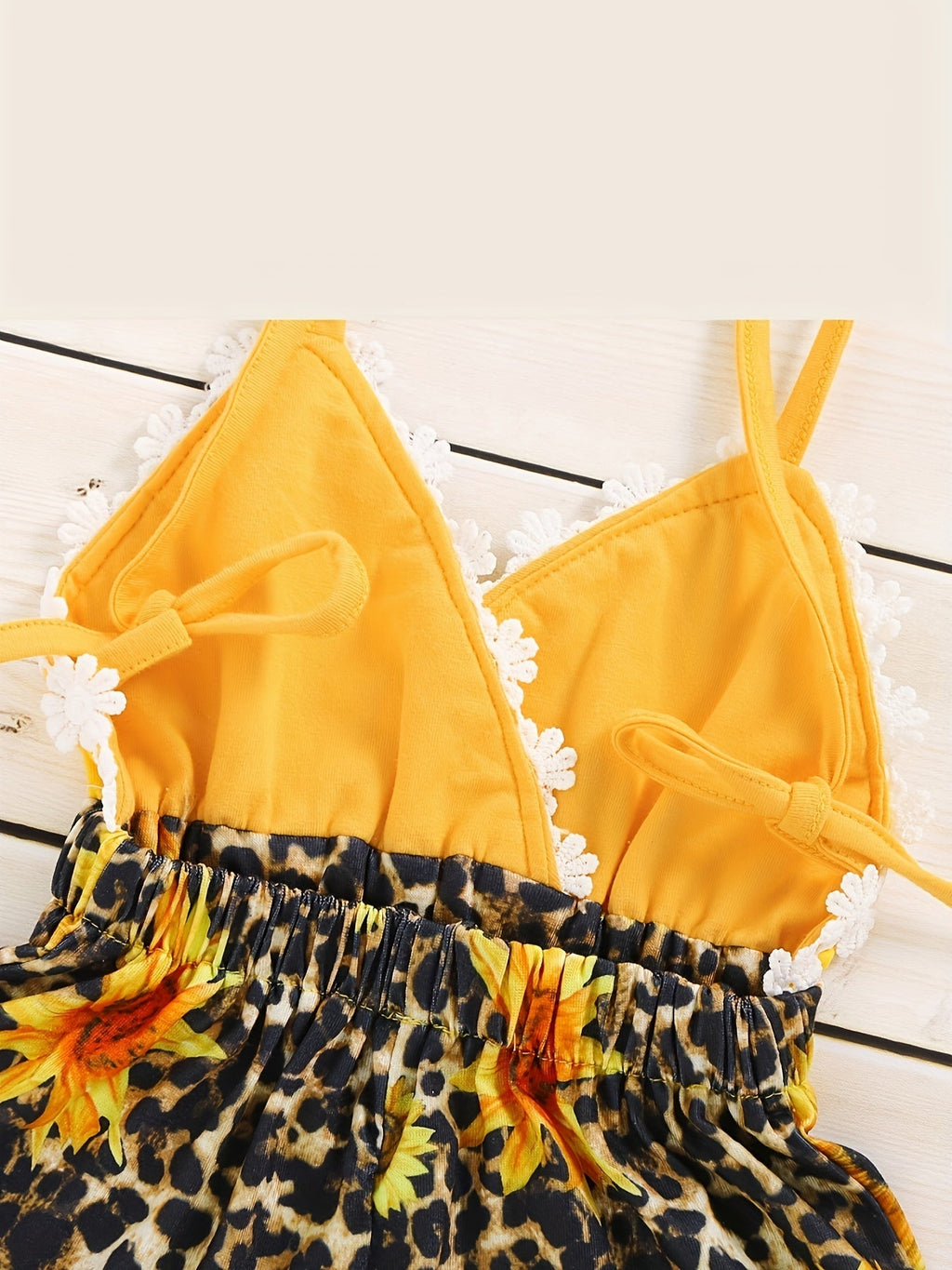 Baby Girl Sunflower and Leopard Print Romper with a Yellow Strappy Bodice and White Flower Trim