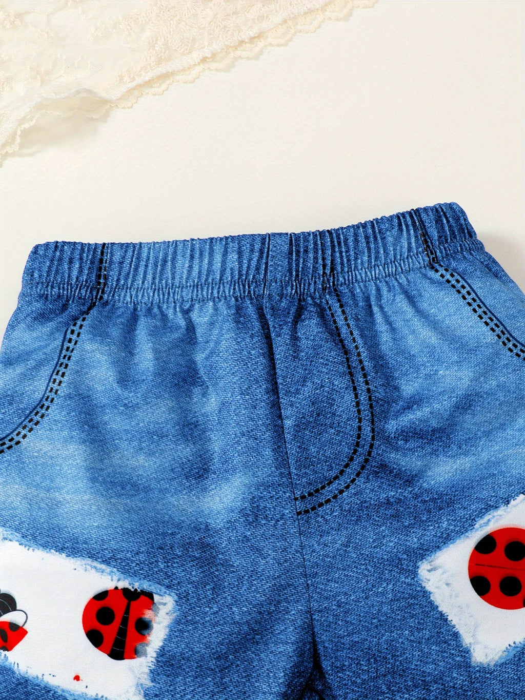 Baby Girl Ladybug Outfit Set with a Ruffle Sleeve Top and Blue Denim Look Shorts for Summer Casual Wear