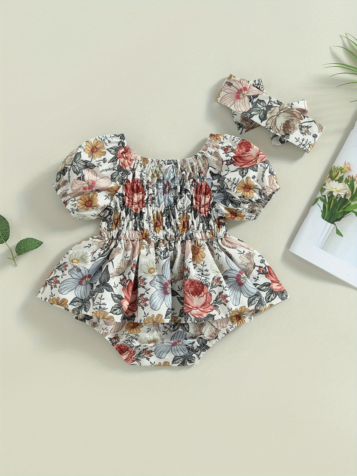 Baby Girls' Floral Romper Outfit with Puff Sleeves and a Smocked Bodice, Including a Matching Headband