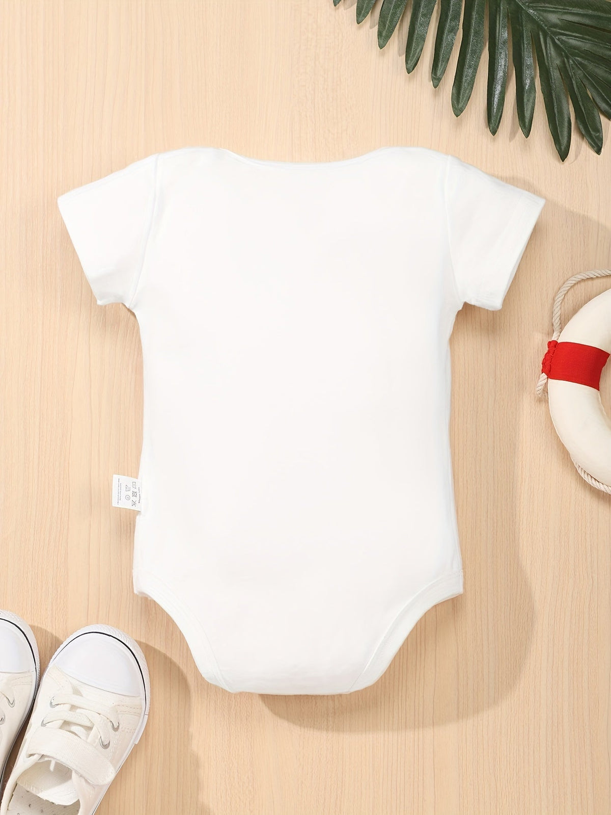 Baby Nine Months Slogan Bodysuit in White with Short Sleeves and Crotch Snaps for a Funny Everyday Outfit
