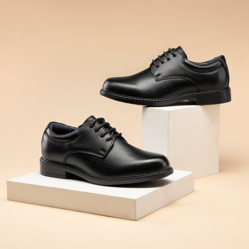 Boys' Dress Shoes in Black or White with Open Lace-Up Panels and a Plain Rounded Toe for Formal Outfits