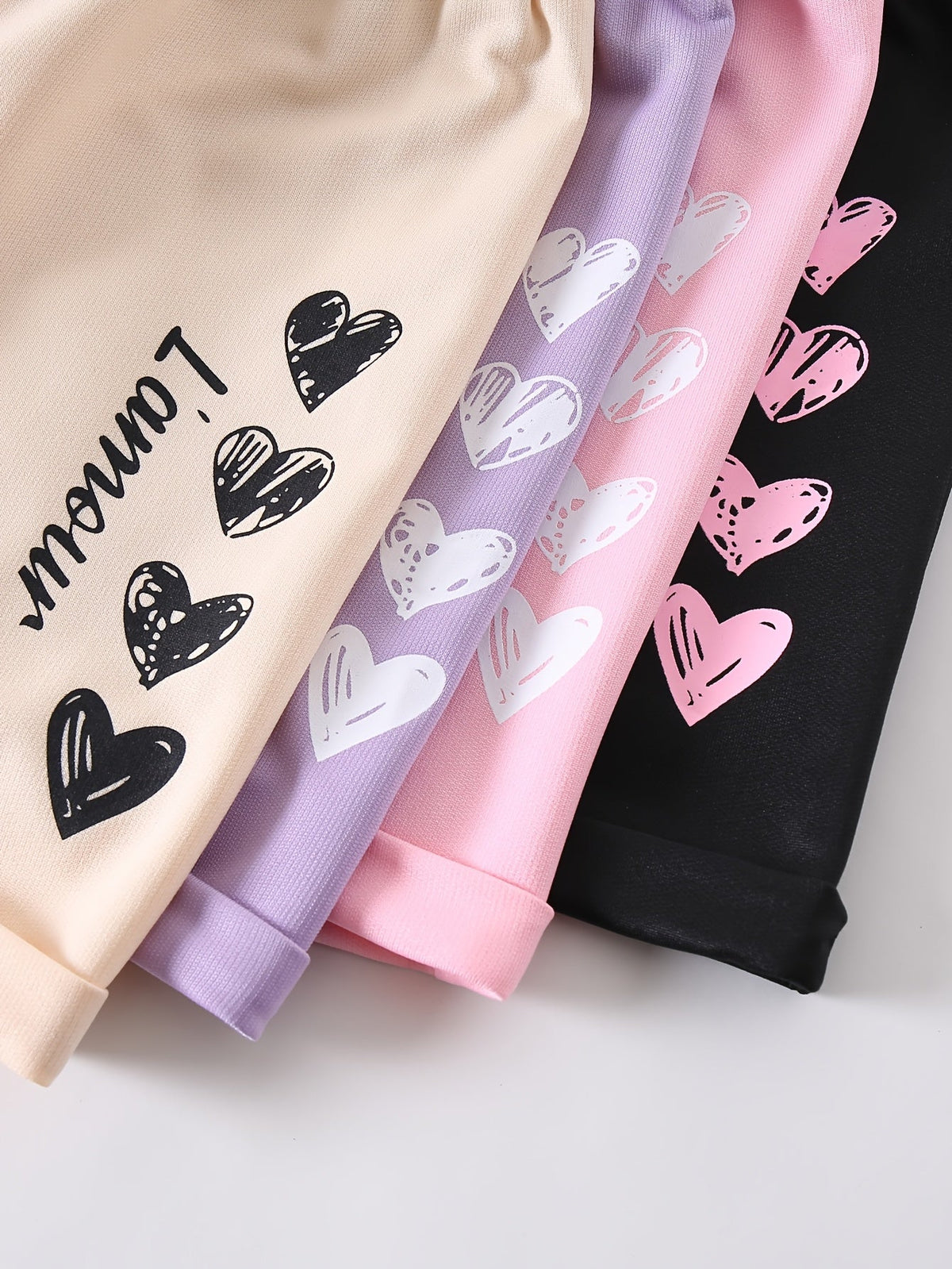 Girls' Heart Print Shorts 4-Pack with Bow Front Detail and Mixed Colors for Spring and Summer Outfits