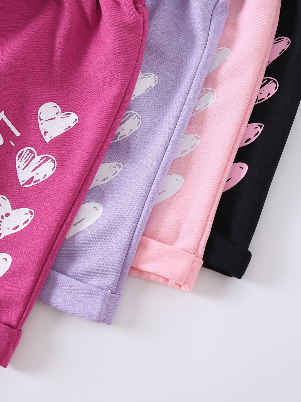 Girls' Heart Print Shorts 4-Pack with Bow Front Detail and Mixed Colors for Spring and Summer Outfits