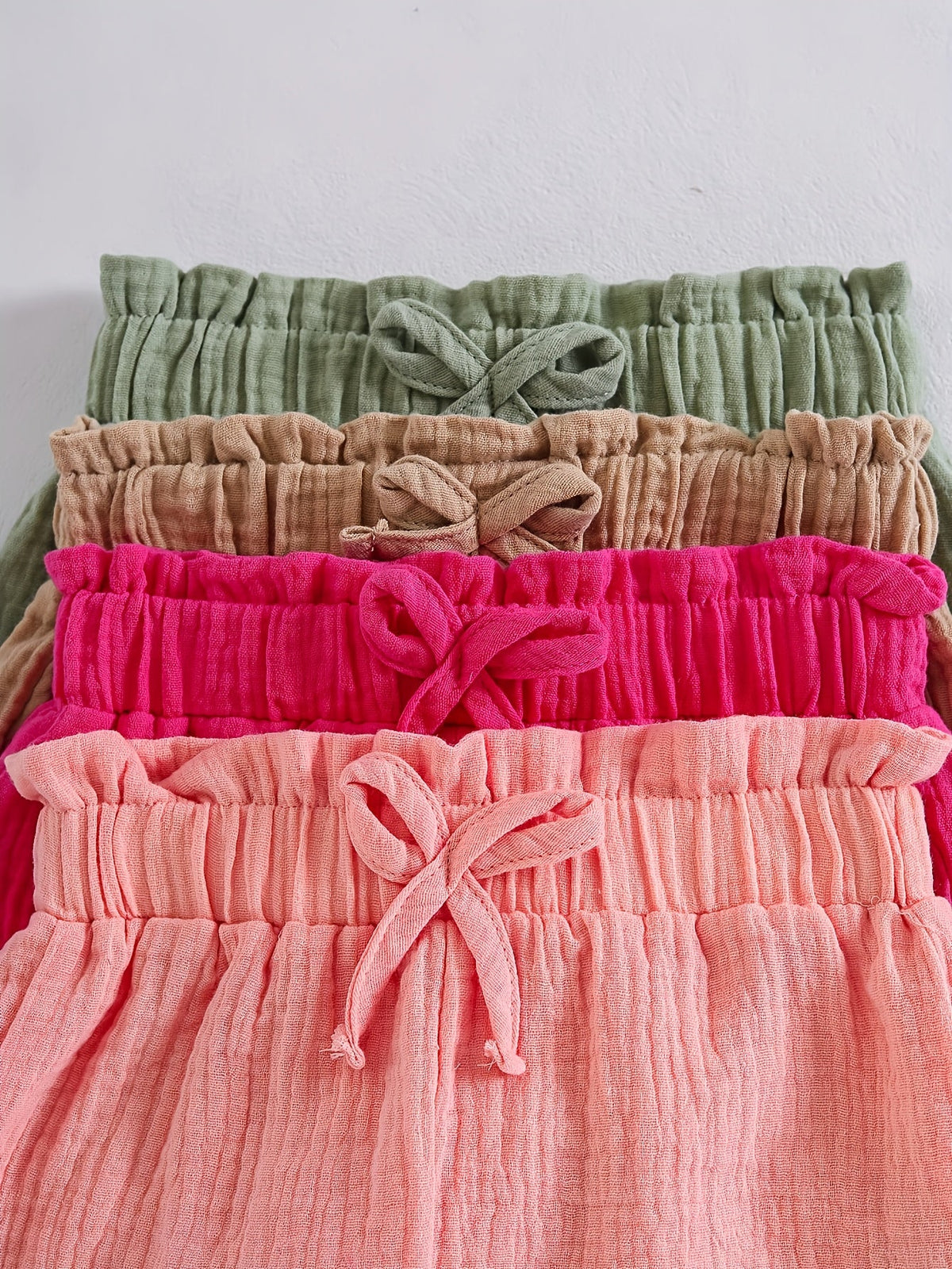 Girls Textured Shorts Four-Pack with Bow Details and Elastic Waists for Colorful Summer Casual Outfits