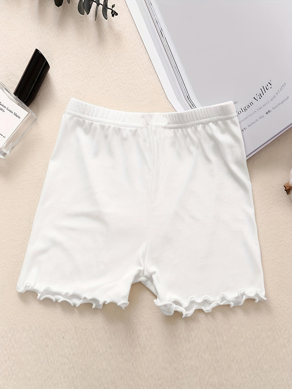 Girls' Seven-Pack Boxer Briefs with Bow Details and Lettuce Hems in Solid Colors for Everyday Layering
