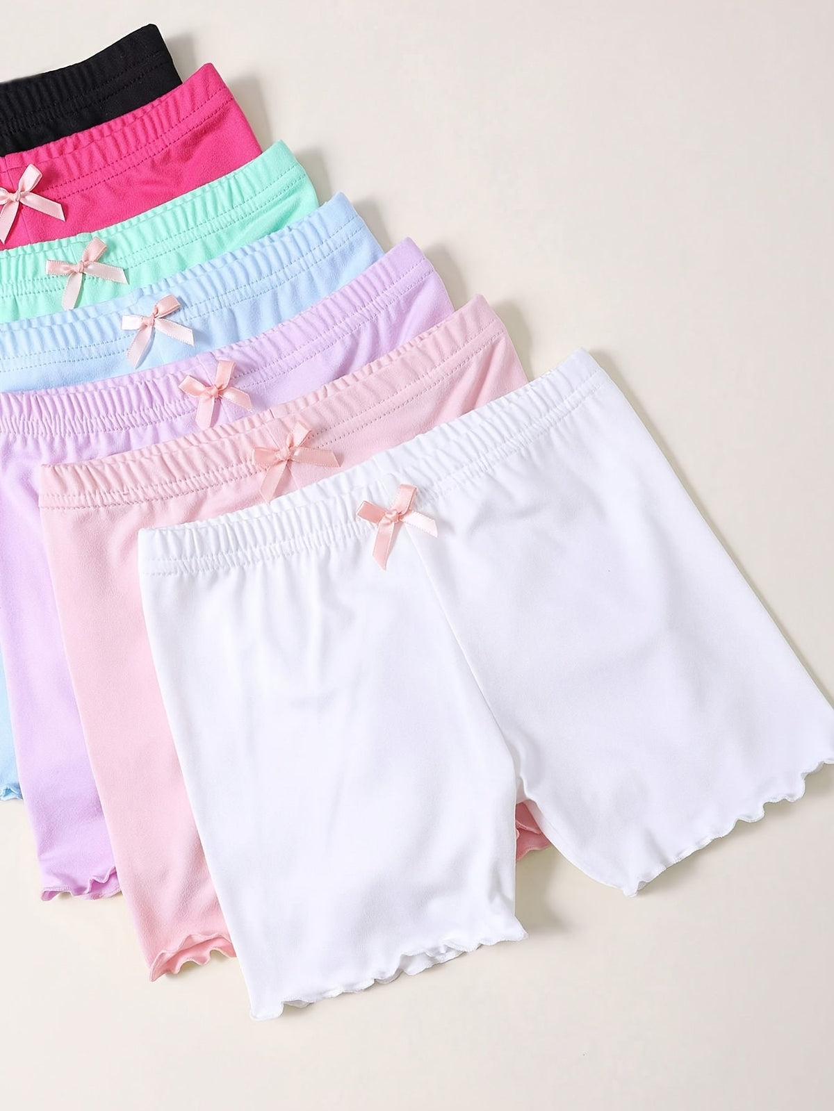 Girls' Seven-Pack Boxer Briefs with Bow Details and Lettuce Hems in Solid Colors for Everyday Layering