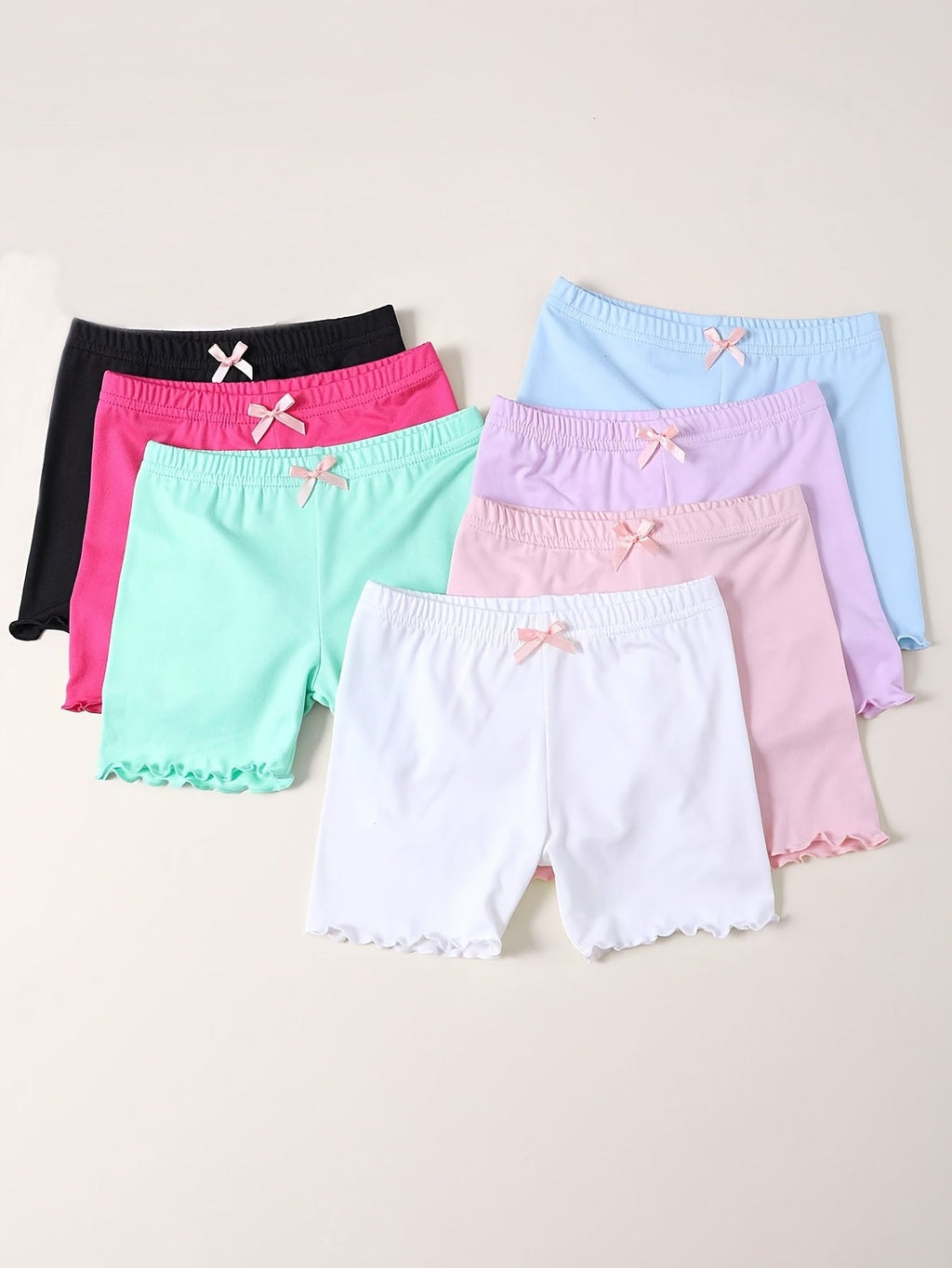 Girls' Seven-Pack Boxer Briefs with Bow Details and Lettuce Hems in Solid Colors for Everyday Layering