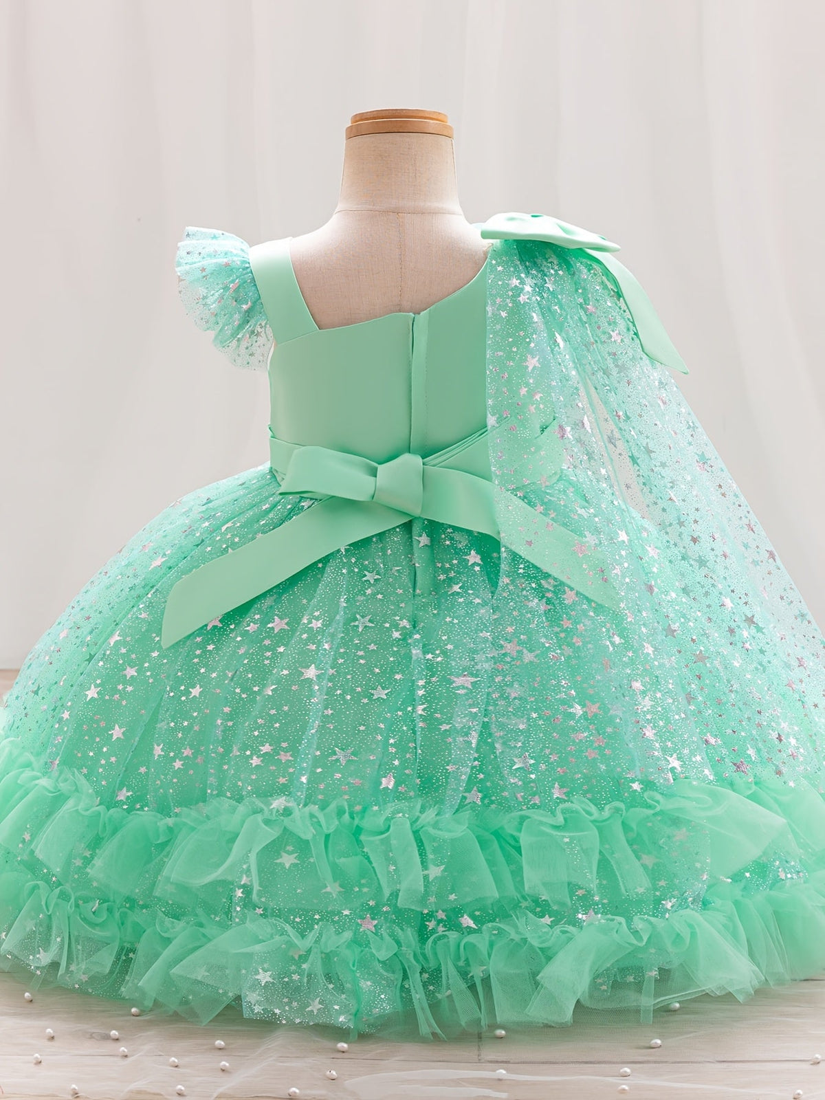 Girls' Star Tulle Party Dress with Large Bow Details and a Tiered Skirt for Birthdays and Celebrations