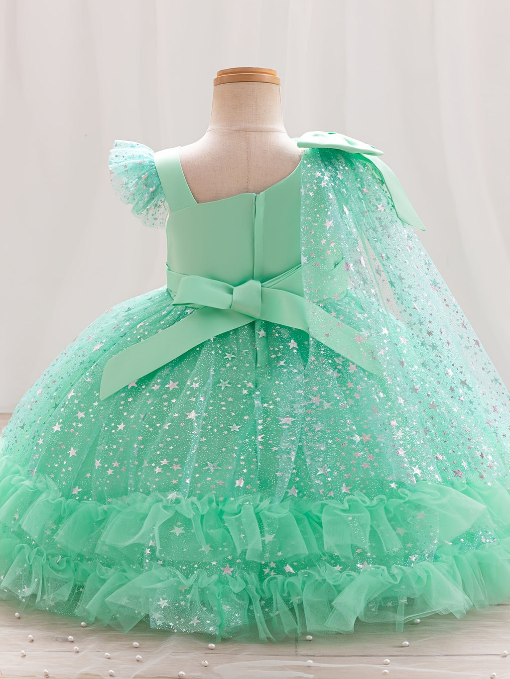 Girls' Star Tulle Party Dress with Large Bow Details and a Tiered Skirt for Birthdays and Celebrations