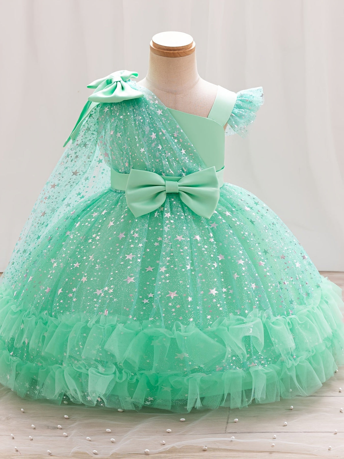 Girls' Star Tulle Party Dress with Large Bow Details and a Tiered Skirt for Birthdays and Celebrations