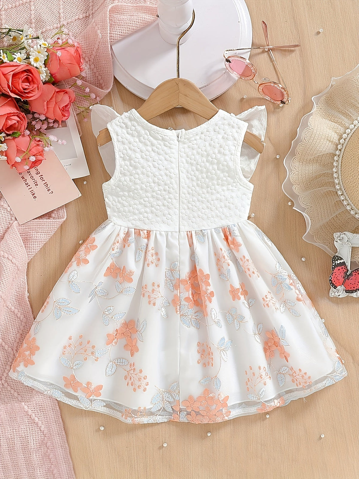 Baby Girl White Party Dress with Textured Bodice and Floral Mesh Skirt Plus a Matching Waist Bow