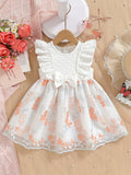 Baby Girl White Party Dress with Textured Bodice and Floral Mesh Skirt Plus a Matching Waist Bow