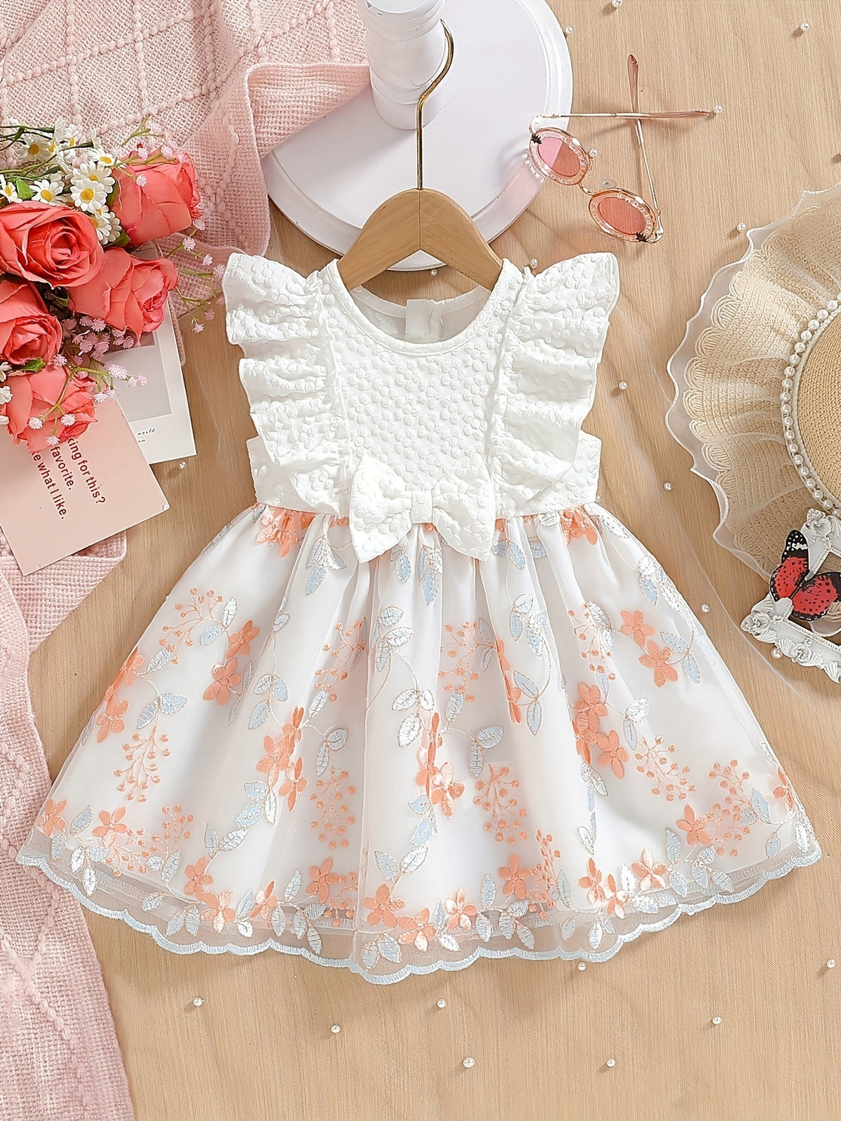 Baby Girl White Party Dress with Textured Bodice and Floral Mesh Skirt Plus a Matching Waist Bow