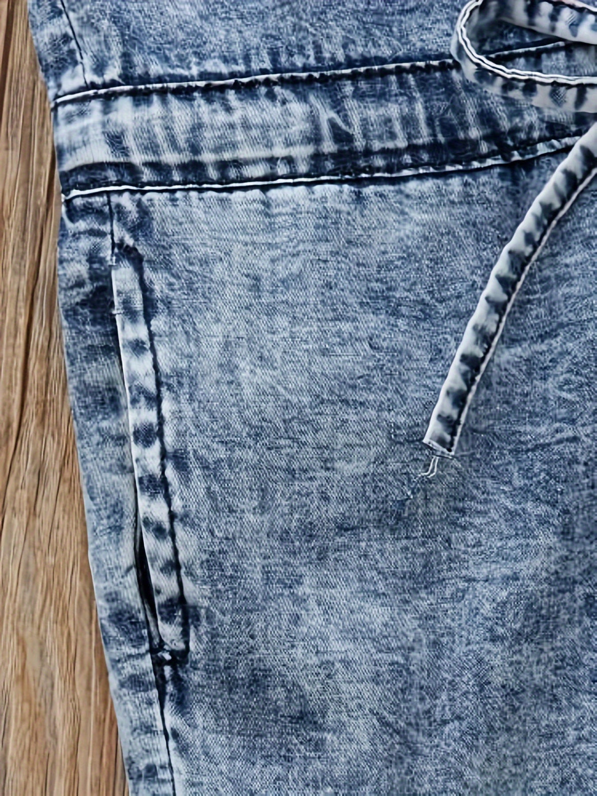 Girls' Blue Denim Jumpsuit with Chest Pockets and a Tie Waist for Collared Sleeveless Everyday Outfits