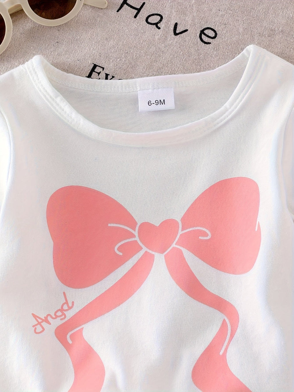 Baby Girls' Pink Bow T-Shirt and Denim Shorts Set with Matching Bow Details and an Elastic Waist