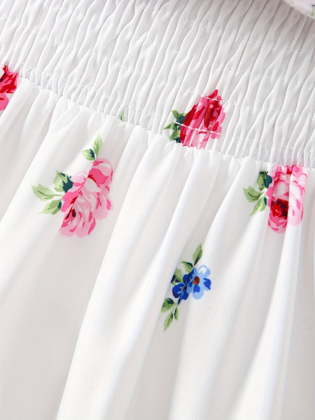Girls' White Floral Dress with a Ruffled Cold Shoulder Neckline and High-Low Hem for Summer Occasions