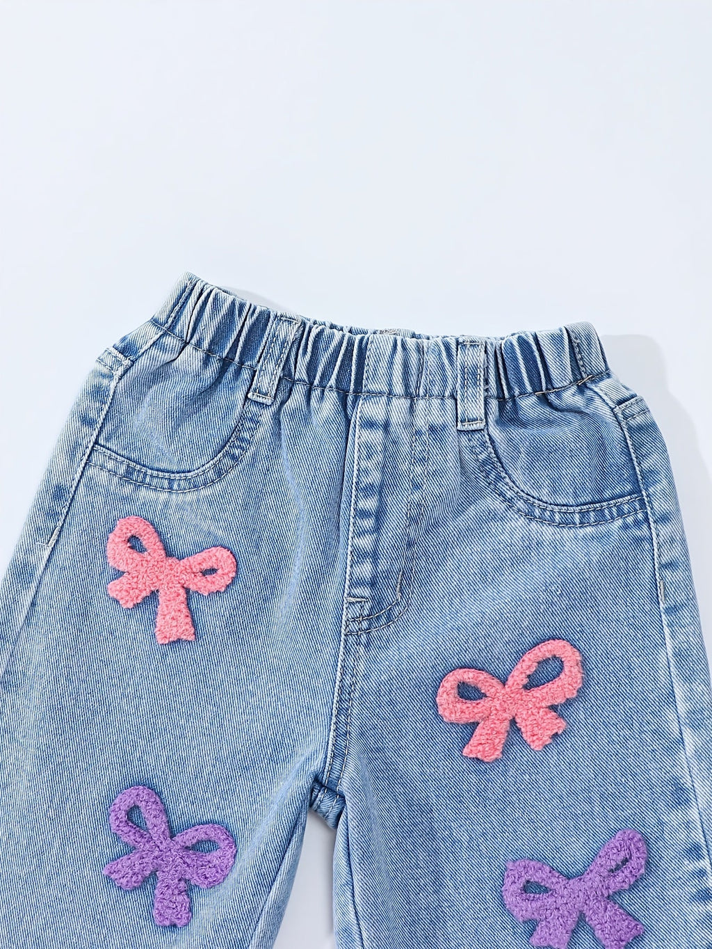 Baby Girl Bow Embroidered Jeans in Light Blue with Pink and Purple Details for Relaxed Everyday Outfits