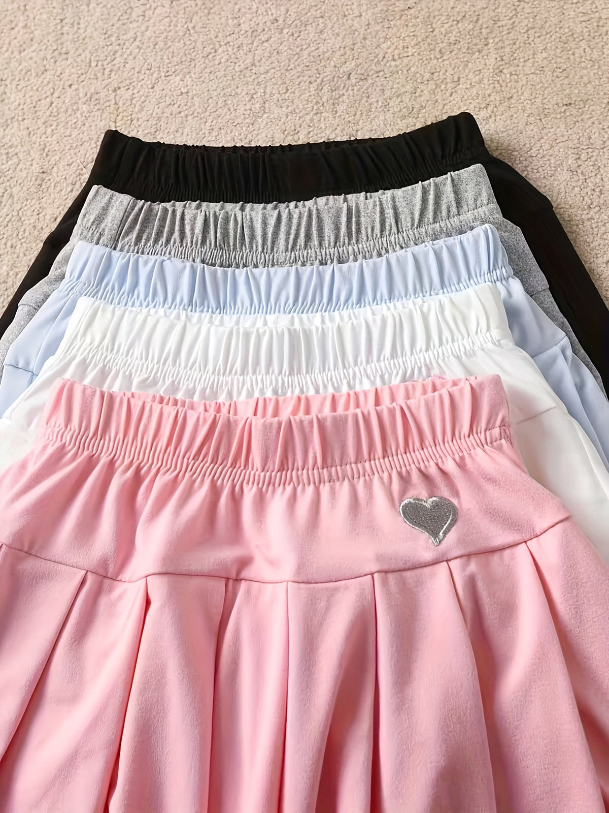 Girls' Pleated Skort 2-Pack in Random Colors with Built-In Shorts and Small Heart Patches at the Waist
