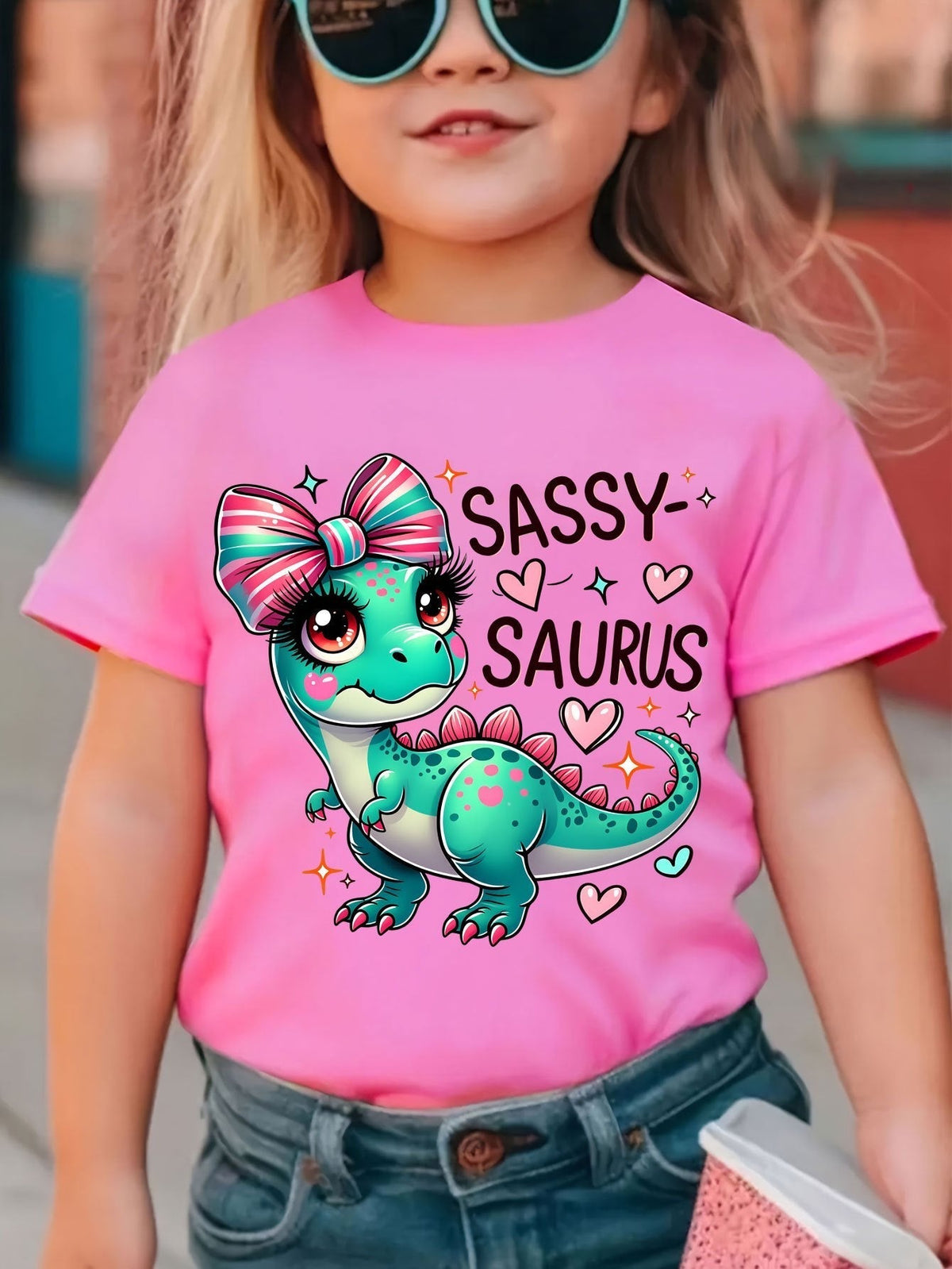 Girls' Sassy Saurus Dinosaur T-Shirt in Rose Red with a Bow Wearing Cartoon Dinosaur and Short Sleeves