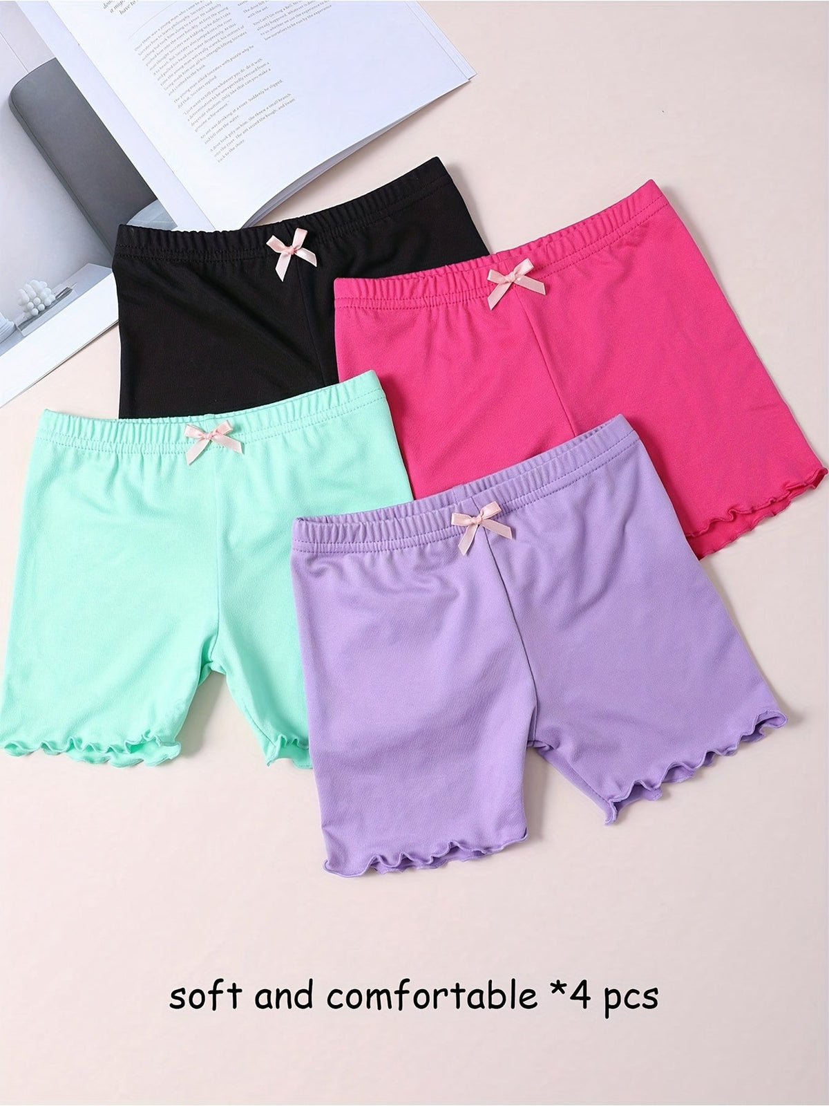 Girls' Layering Shorts Four-Pack with Small Waist Bows and Lettuce Hems for Everyday Dresses and Skirts