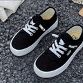 Kids' Low Top Canvas Sneakers with White Laces and Contrast Soles in Black or Red for Casual Outfits
