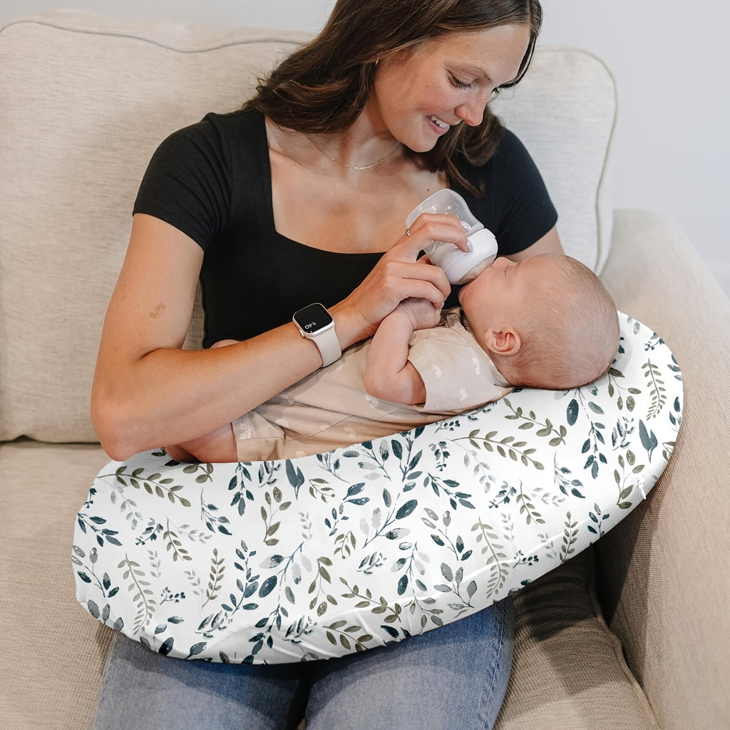 C-Shaped Nursing Pillow with a Removable Printed Cover for Supporting the Arms During Seated Feeding